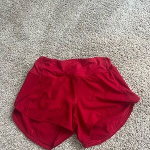 Lululemon Athletica red speed ups